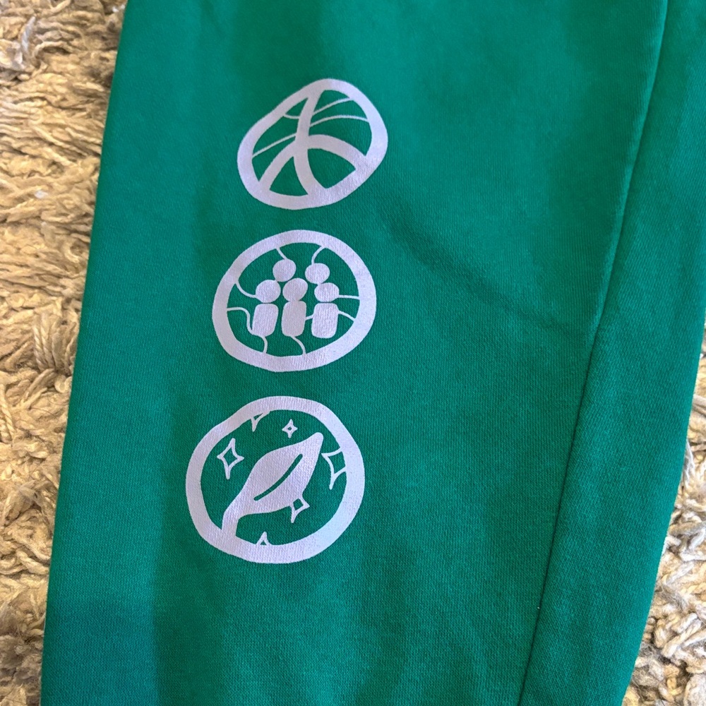 Nike Kids Green Joggers with Fun Graphics extended size L+ - Picture 2 of 5
